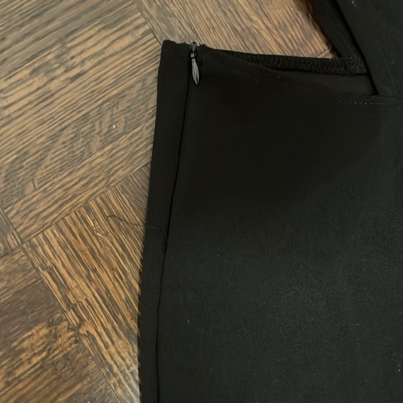 Flared black pants with cutout. - Picture 3 of 3